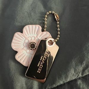 Coach leather floral hang tag rose gold